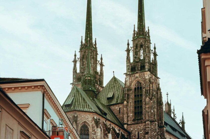 A historic church with twin spires and intricate Gothic architecture. 2