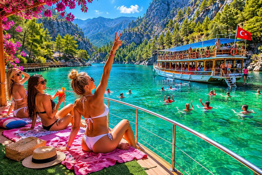 A turquoise lake with people swimming and a boat with a Turkish flag. 3