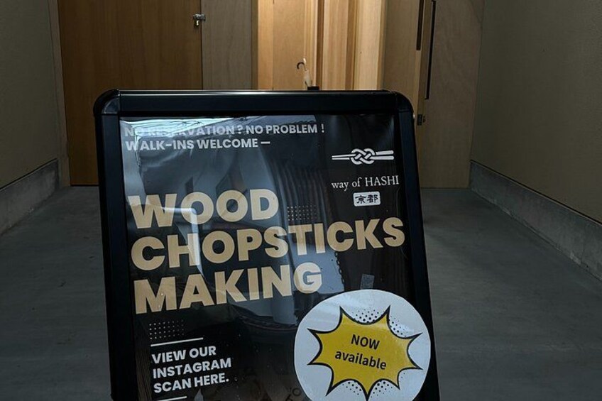 A signboard with text about wood chopsticks making and a way of HASHI. 4