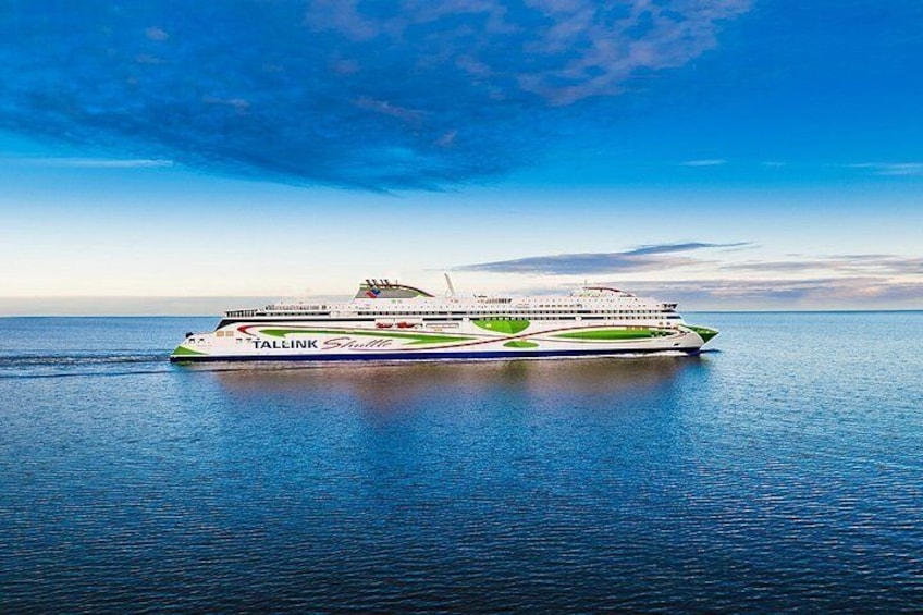 A large cruise ship named 'FALLINK Shuttle' on calm waters. 3