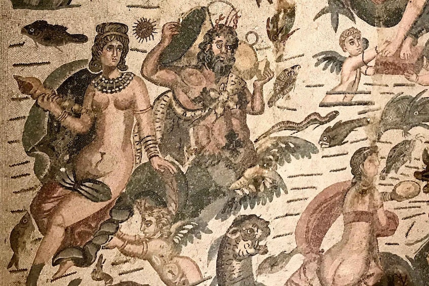 A mosaic with mythological figures, sea creatures, and a child. 3