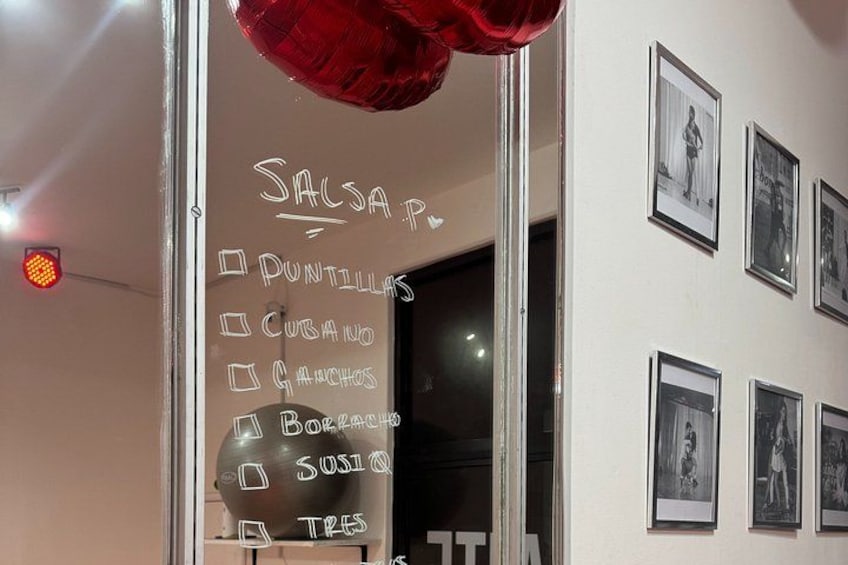 A menu board with items like salsa, pintillias, cubanos, and more. 2