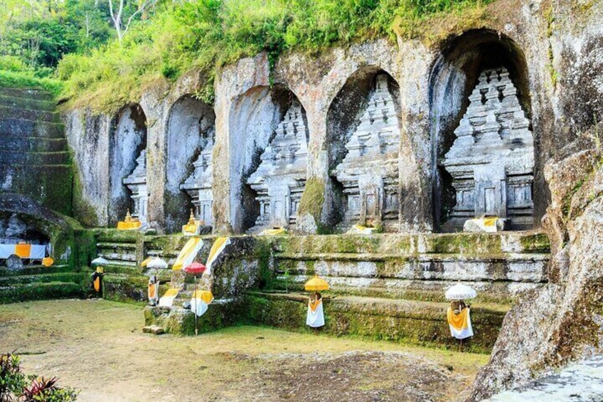 A temple with multiple arched structures and statues. 5