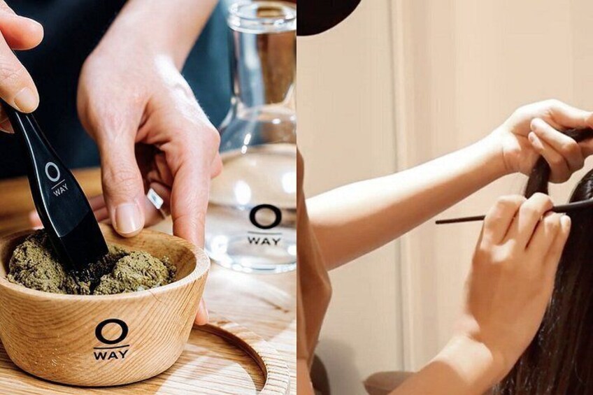 A person using a black tool on a wooden bowl with a logo, and another person painting a nail. 4