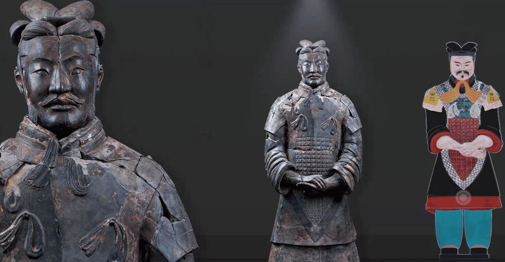 A collection of ancient bronze statues, including a warrior and a figure in elaborate attire. 4
