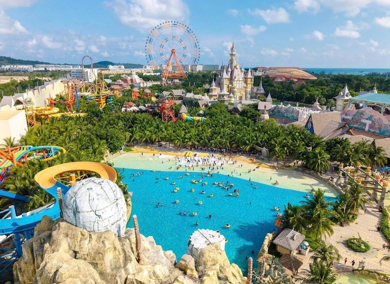 A theme park with a large water attraction, a Ferris wheel, and a castle-like structure. 3