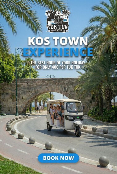 A tuk tuk driving along a curved road with a stone archway and palm trees in the background. 2