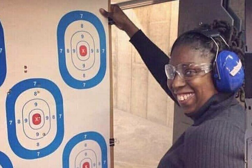 Sharp Shooters Indoor Range experience with a wall of guns 2
