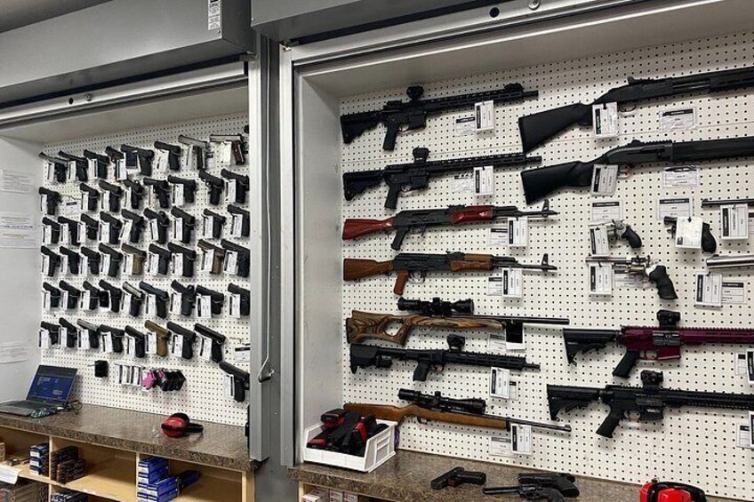 Sharp Shooters Indoor Range experience with a wall of guns 4