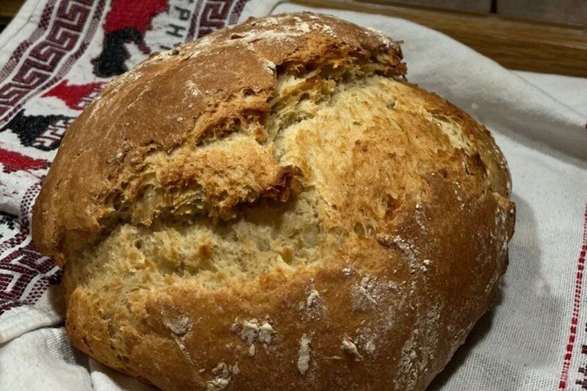 A loaf of bread on a cloth. 4