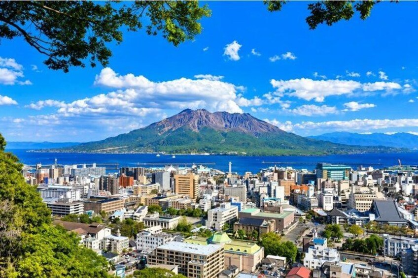 A cityscape with a prominent mountain in the background. 4
