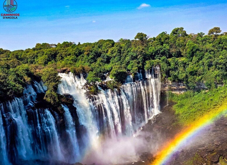 A waterfall with a rainbow. 3