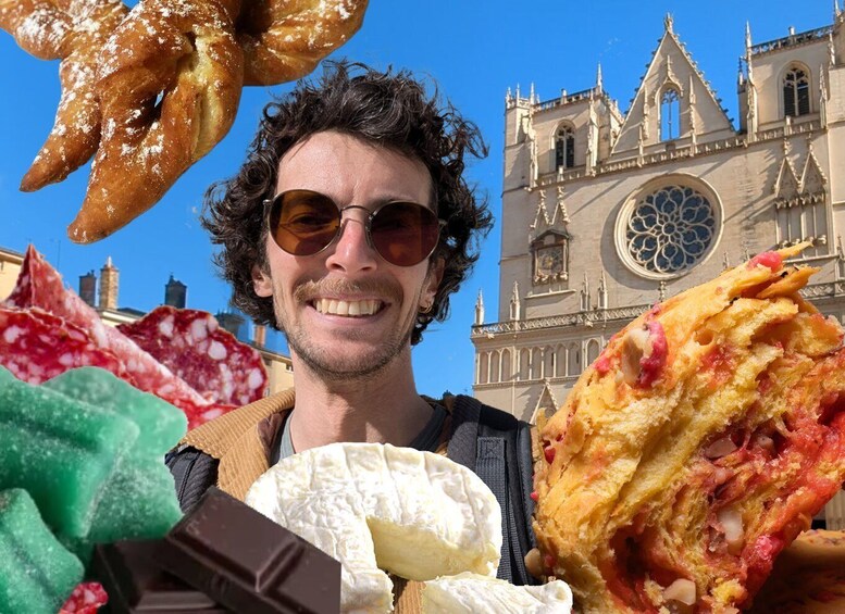A person holding various food items in front of a historic building. 1