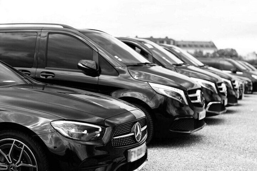 A row of parked cars. 1