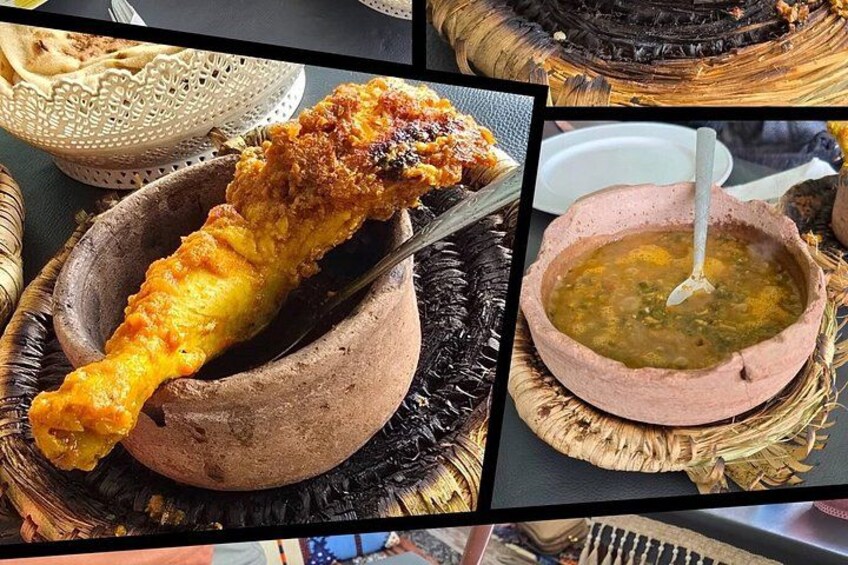 A traditional dish with a roasted leg of meat and a bowl of soup. 3