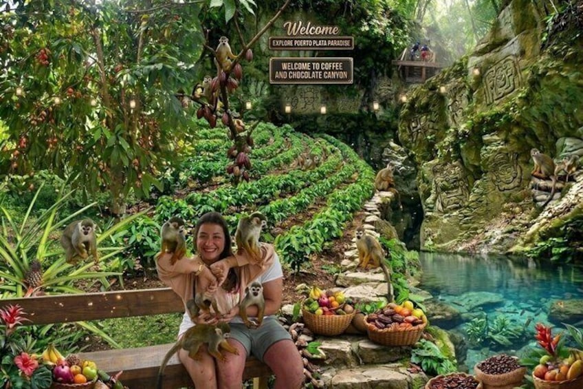 A woman with monkeys, surrounded by lush greenery and a waterfall. 1