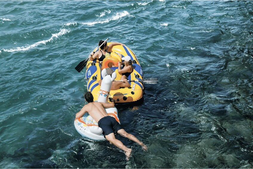 A person on a raft in the water. 3