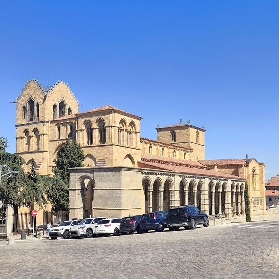 A historic cathedral with a prominent bell tower and arched windows. 3