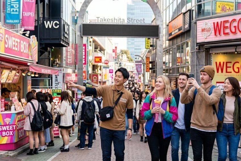 A busy street with people walking, a 'SWEET BOX' shop, and signs for 'TAKESHITA Street' and 'WEGO.' 1