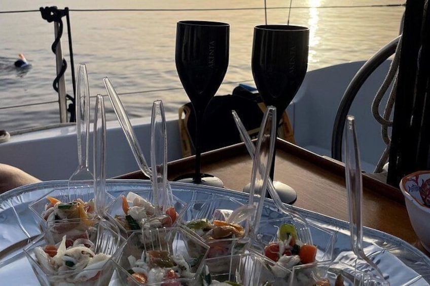 Aperitif at sunset on a sailboat 3