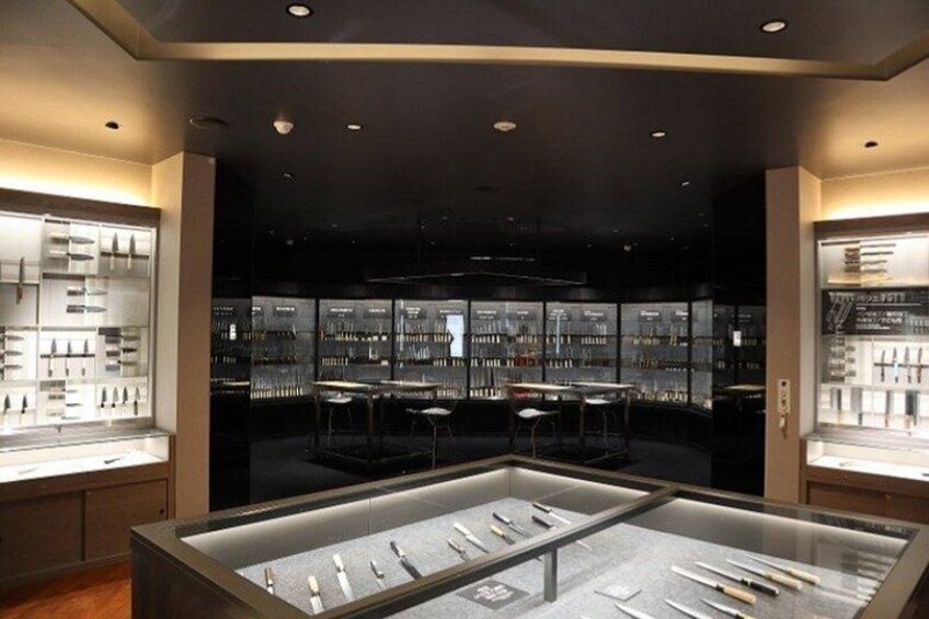 A jewelry store with glass display cases and shelves. 2