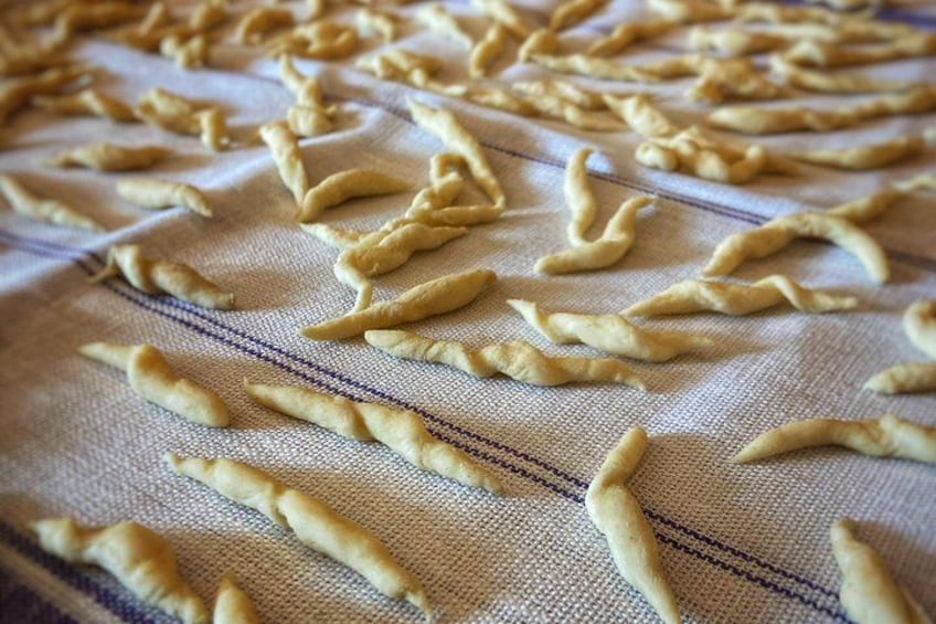 Hands in pasta Pesto and Trofie as at home 3