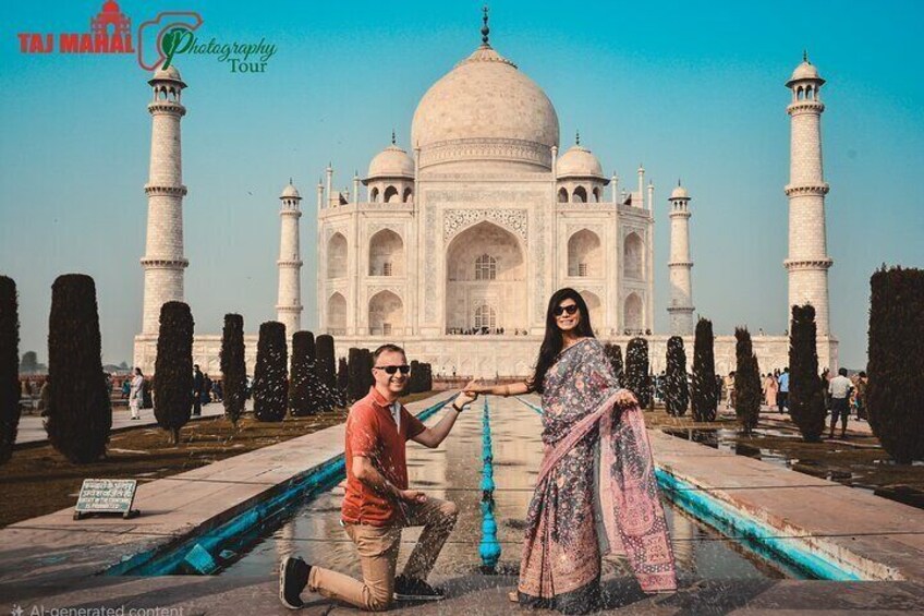 A couple in front of the Taj Mahal with a man kneeling and proposing to the woman. 1