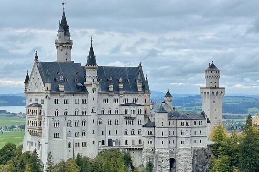 A large castle with multiple towers and a moat. 1