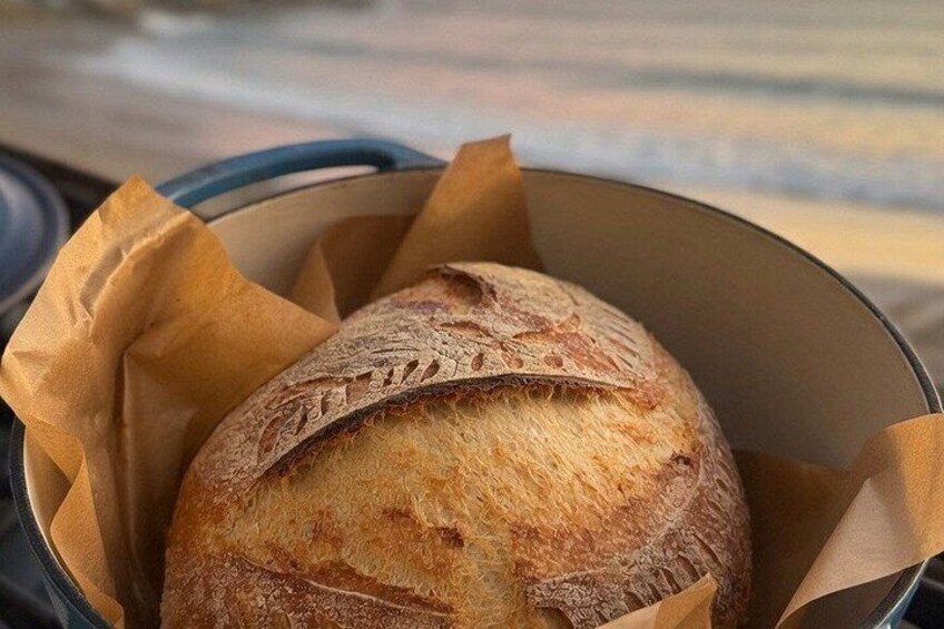 A loaf of bread in a baking dish. 3