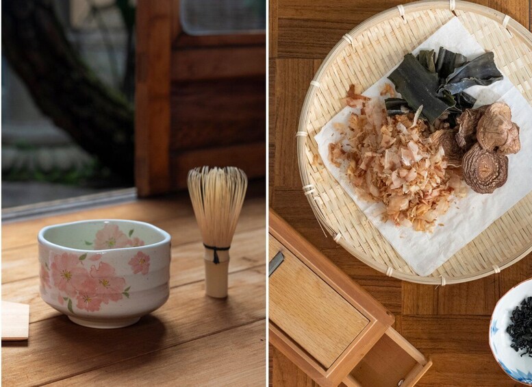 A traditional Japanese tea ceremony setup with a floral-patterned tea bowl, a bamboo whisk, and a woven tray with matcha and wasabi. 1