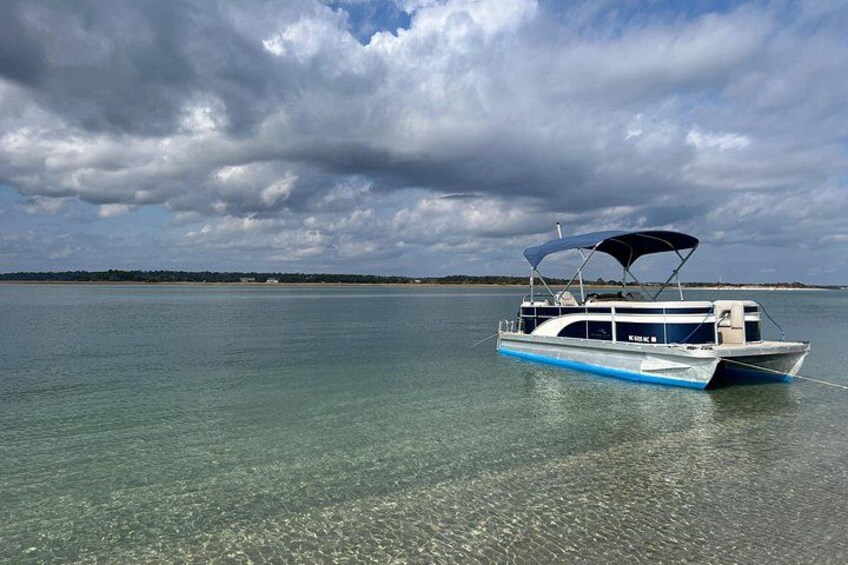 The Leprechaun our 18’ Bennington Pontoon boat with room for up to 6 1