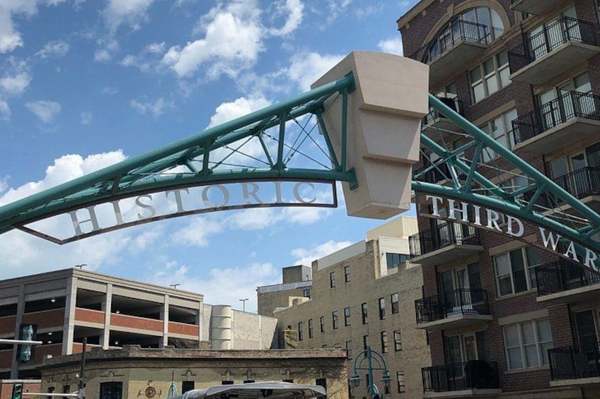 A historic sign with 'HISTORIC' and 'THIRD WARE' on a building. 2