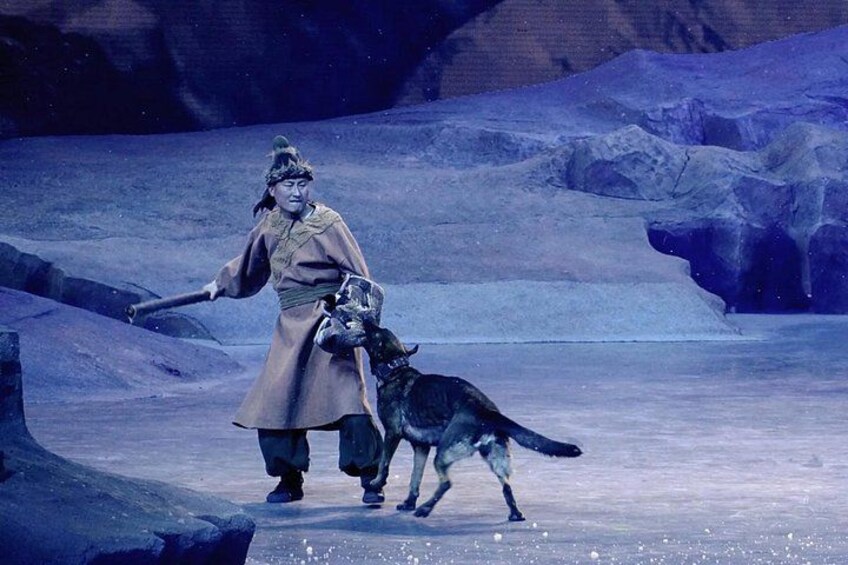 A person in traditional attire walking a dog on a snowy landscape with ice formations. 5