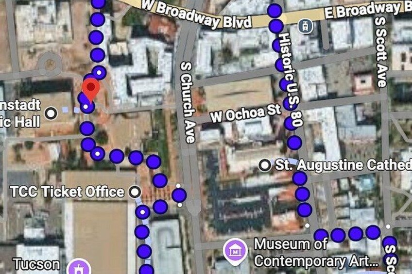 A map with a route marked by blue dots, passing through various landmarks like the TCC Ticket Office and St. Augustine Cathedral. 4