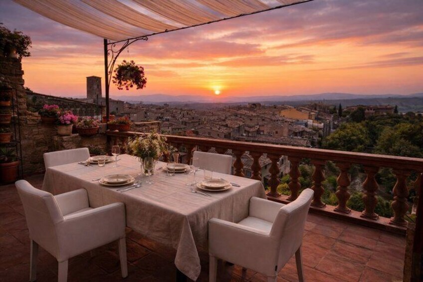 A sunset view from a terrace with a table set for four. 1
