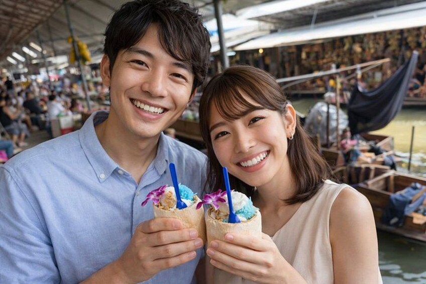 Two people holding drinks with straws and a boat in the background. 4