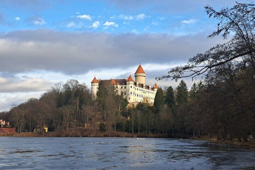 A castle on a hill overlooking a river. 1