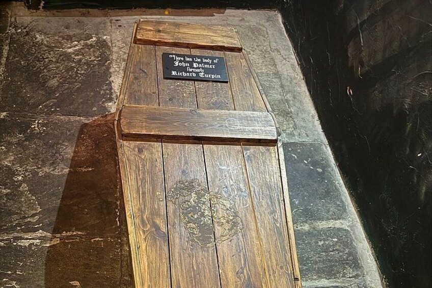 A wooden bench with a plaque. 5