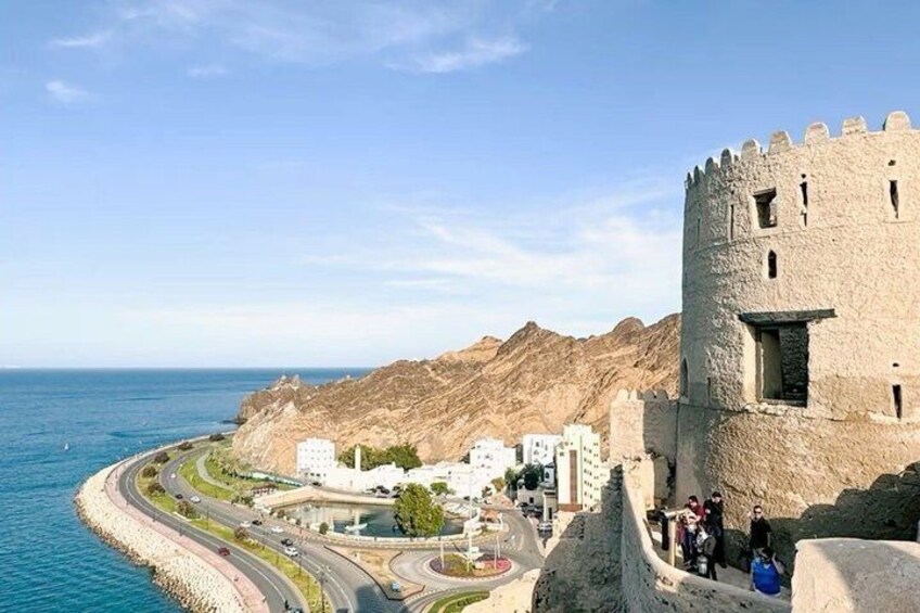 A coastal fortification with a road leading to it, overlooking the sea. 4