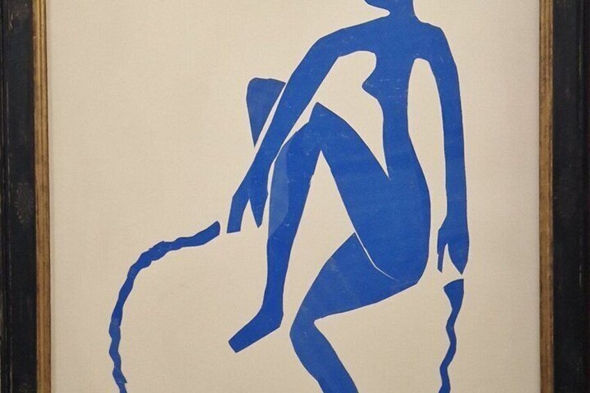 Eine blaue Silhouette einer Person, die auf einem Stuhl sitzt. 2