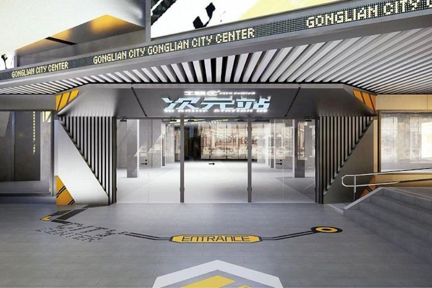 A modern building entrance with a sign reading 'Gongliao City Center' and a sign with Chinese characters. 1