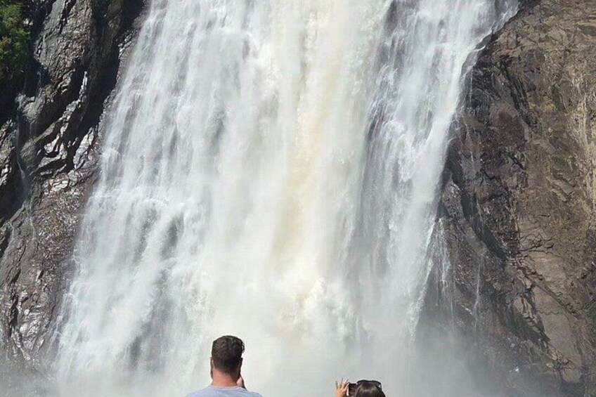A waterfall cascading down a rocky cliff. 2