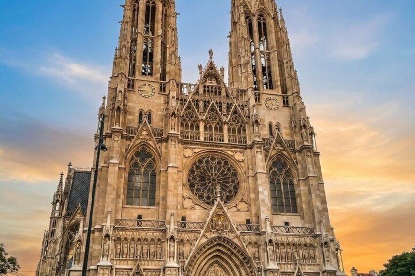 A Gothic cathedral with twin spires, large rose window, and intricate stonework. 3