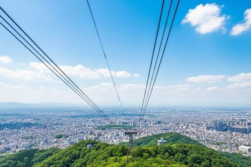 A cable car system with a cityscape in the background. 5