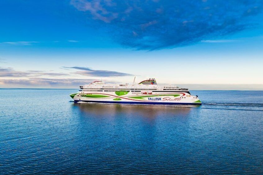 A large cruise ship named 'Tallink Shuttle' sailing on calm waters. 2