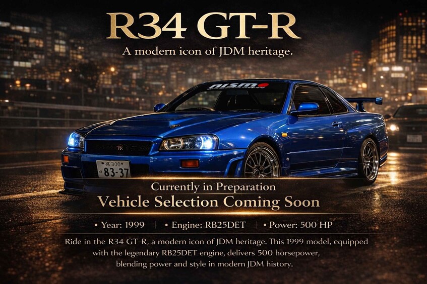 A blue Nissan GT-R with a license plate, parked on a wet road at night. 2
