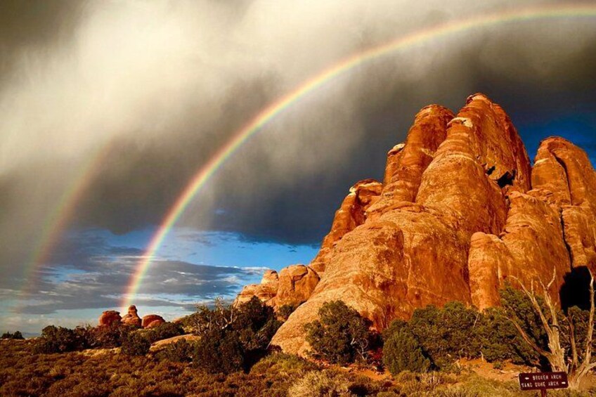 The fins of Sand Dune Arch after spring showers leave a rainbow. 4