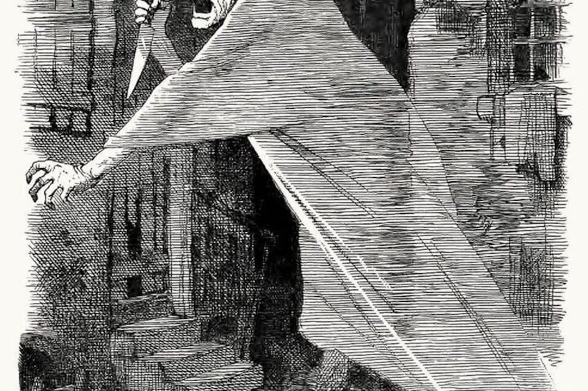 A person in a long cloak standing at a doorway. 5
