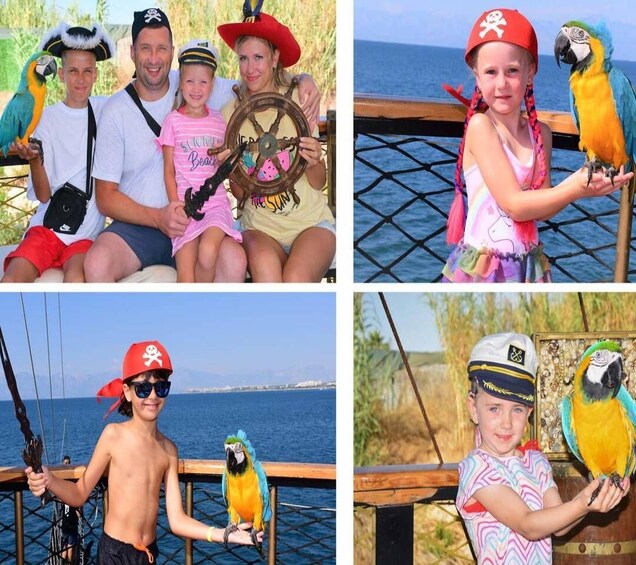A group of people with parrots, some wearing pirate hats, by a body of water. 2