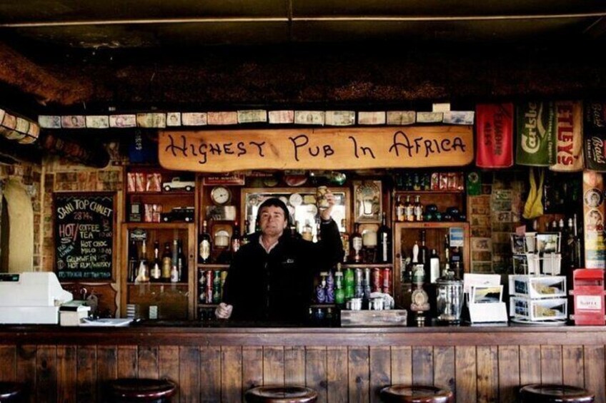 A bar with a sign reading "Highest Pub in Africa". 2